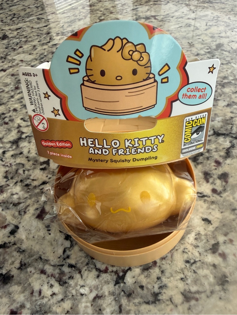 CINNAMON ROLL: Hello Kitty Golden Mystery Squishy Dumpling Plush - Gold